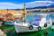 Acryl-Bild 80 x 50 cm: Traditionelle Boote und alter Leuchtturm in der Stadt Rethymno, Insel Kreta, Griechenland. (106411006)