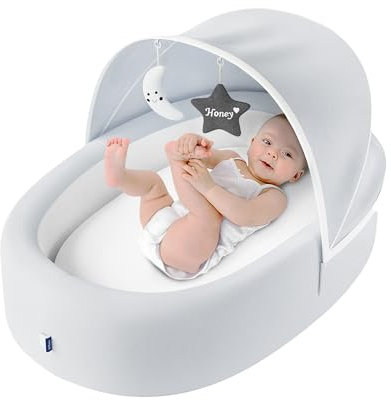 Biliboo Premium Portable Baby Lounger Nest - Faltbare Reise-Stubenwagen für Neugeborene & Säugling mit Netz-Baldachin, 2 Spielzeugen, wasserdichter Matratze & abnehmbarem Bezug - Creme