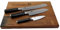 KAI Shun Premier Tim Mälzer Messerset Officemesser TDM-1700 +ultrascharfes Santoku TDM-1702 + Brotmesser TDM-1705 + massives Eichenbrett aus Fassholz, 40x30 cm Angebot