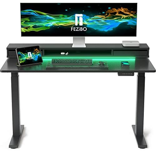 FEZIBO 140 * 60cm Electric Standing Desk with Monitor Stand, Height Adjustable Table with LED Strips, Ergonomic Home Office Furniture with 2 Drawers Storage Gaming Workstation, Black Carbon Fiber