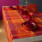 Garnier Thiebaut Tischdecke Mille Wax Damast Ketchup rund Ø 180 cm