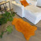 Lammfell Orange 100-110 cm