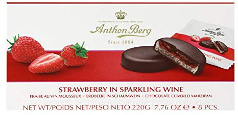 Fraise dans le vin scintillant 984051 Chocolat avec pâte d'amande (41 %) et garnissage (25 %) avec fraises dans des minuscules scintillantes.