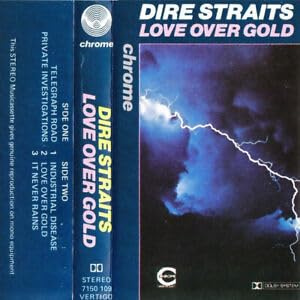 DIRE STRAITS. LOVE OVER GOLD. ORIGINAL 1982 CHROME AUDIO CASSETTE TAPE WITH FOLD OUT BOOKLET & PAPER LABELS.