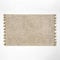 Homescapes Pompon Badematte 50x80 cm beige, Badteppich getuftet, Baumwoll-Badvorleger mit Bommeln
