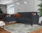 Dmora - Schlafsofa mit Halbinsel Angel, Wende-Ecksofa, Modernes Sofa mit Stauraum, Chaiselongue und 3 Kissen, 230 x 153 x 85 cm, Blau