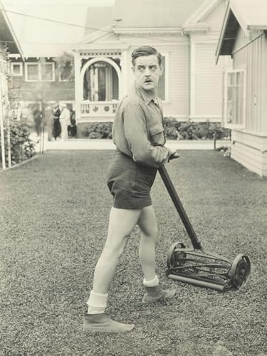 ART.COM Wall Photo Suspicious Man with a Push Reel Lawn Mower, 12 x 16
