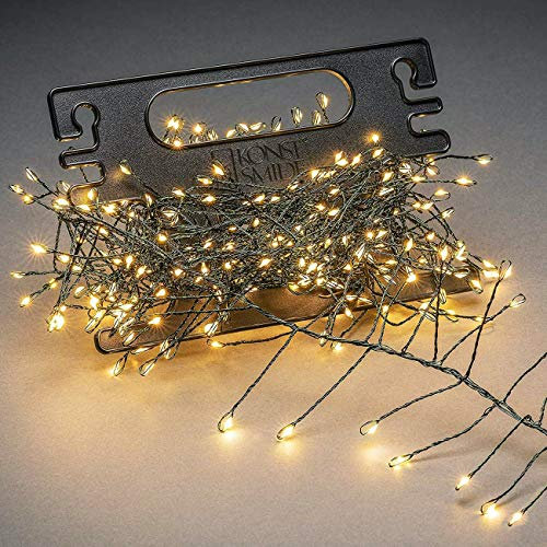 Konstsmide Micro LED Büschellichterkette Cluster, mit Aufroller, 400 bernsteinfarbene Dioden, 12V Außentrafo, dunkelgrüner Draht - 6471-830