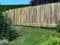 Gartenwelt Riegelsberger Premium Staketenzaun aus Kastanie Komplettset Rollzaun Lattenabstand 2-3 cm Zaunlänge 5 m Höhe 150 cm inkl. Pfosten Einschlaghülsen mit Schrauben Tor H150xB100cm & Krampen