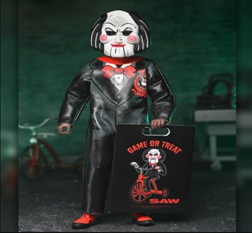 NECA Billy The Puppet Saw Movie 6 Inch Scale Clothed Action Figure, Black Suit with Red Bow Tie, Collector Display with Game or Treat Bag