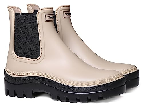 Damen-Gummistiefelette. Sie ist in dunklen und glänzenden Tönen gefertigt.