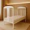 ALAVYA HOME® Tora Babybett 60x120 cm mit Matratze und Lattenrost | Kinderbett Gitterbett 120x60 mit 3 Schlupfsprossen aus massivholz Kiefernholz - Weiß