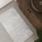 WECONhome – Waschbarer und Rutschfester Badezimmerteppich im dezenten Linien-Design – Modernes Design und hoher Komfort für Dein Bad – Mauri (70 x 120 cm, weiß)