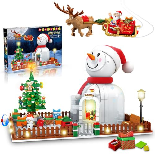HOGOKIDS Weihnachtsmann Haus Bauspielzeug mit LED Licht - 566 Stück Winterzeit Schneemann Bausatz Weihnachtsbaum Dekoration Spielzeug Geschenk für Kinder Mädchen Jungen Alter 6 7 8 9 10+ Jahren alt