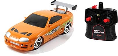 Jada Toys Fast & Furious RC Auto Brian's Toyota Supra, ferngesteuertes Auto mit 2-Kanal Funksteuerung, Turbofunktion, fährt vorwärts-rückwärts, links-rechts, Maßstab 1:24, ab 6 Jahren, orange, 253203021