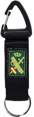 Llavero original de tela verde Guardia Civil con la bandera de España y argolla plateada. Elástico e ideal para personalizar llaves, bolso, mochila...