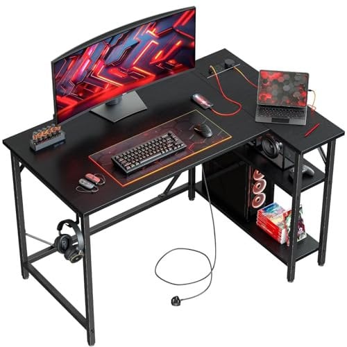 DOMSHOCT Small L Shaped Gaming Desk with Power Outlets, 100x70cm Corner Computer Table with Large Reversible Storage Shelves, Home Office PC Workstation with Hooks for Writing Study, Black