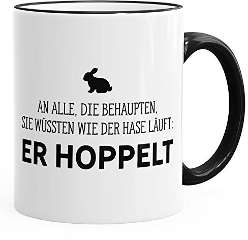 MoonWorks Spruch-Tasse an alle die wissen wie der Hase läuft - er hoppelt Farbkante schwarz Unisize
