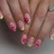 Auiremrti 24 Stück French Press on Nails,Kurze ovale künstliche Nägel mit Designs,Rotes Hawaii-Blumenmuster,Sommer-Klebernägel,Mandelförmige Acryl-Kunstnägel
