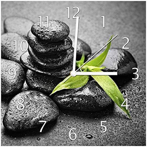 Wallario Design-Wanduhr Bambustrieb auf schwarzen Steinen, benetzt mit Wasser-Tropfen aus Glas, Motiv-Uhr Größe 30 x 30 cm, weiße Zeiger