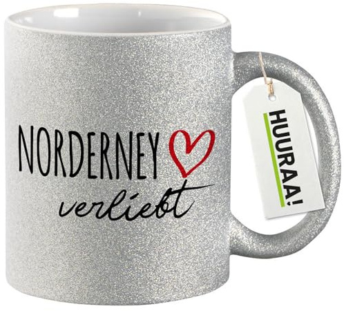 Huuraa Glitzertasse Norderney verliebt Geschenk | Motivtasse 330ml Glitzer Tasse mit Spruch Silber Keramik Kaffeebecher Geschenkidee Silver Glitter Becher mit Motiv