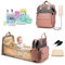 FANDARE Windelrucksack Wickeltasche Baby Wickelrucksäcke Tragbare Reisewindeltasche mit Faltbarem Kinderbett Babybettrucksack Reisetasche für Mama Papa Wickeltasche Kinderwagen mit USB-Ladeanschluss