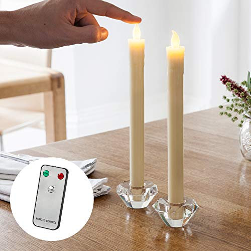 Lights4fun Set of 8 Battery Operated Warm White LED Ivory Wax Taper Candles with Remote