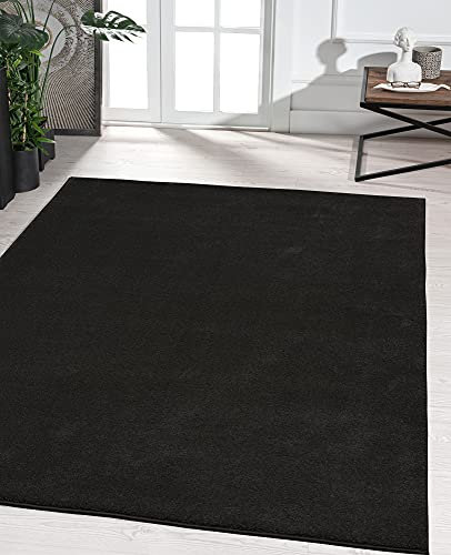 the carpet Marley eleganter Designer Teppich Wohnzimmer, weicher & pflegeleichter Kurzflor Wohnzimmerteppich in Schwarz, Teppich 60 x 110 cm