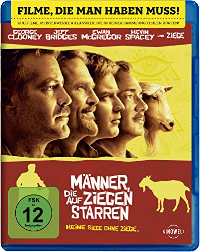 Männer, die auf Ziegen starren