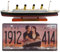 OPO 10 - Lotto di 2 Oggetti da Collezione del Famoso transatlantico RMS Titanic: Nave + Targa Decorativa