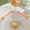 JJWNMLL Kitchen Triangle Sink Strainer, Collapsible Holder Sink Strainer for Kitchen Leftovers, ABS Material, with Grey Triangle and 100PCS Large Size Strainer Bag (Orange)