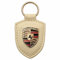 Porsche Schlüsselanhänger, blaues Leder mit Metallwappen