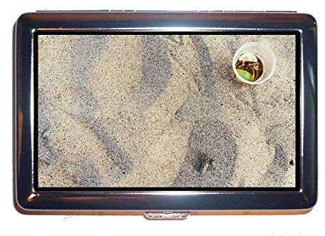 Portefeuille ou étui à cigarettes, sable de la plage, étui de carte de visite Protection Credit