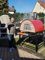 FOUR A BOIS MAXIMUS PRIME ARENA ROUGE avec Chariot PARMA - Un four a bois idéal pour une cuisson au feu de bois de Pizza et Pain traditionnel- Four a bois portatil - Four a bois exterieur… B0CMR1RW5C