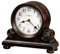 Howard Miller Murray Kaminuhr 635-150 - Vintage Abgenutzte Schwarze Oberfläche mit braunen Untertönen, aufgesetzten Rosetten und Brötchen, Quarz, Triple-Chime-Harmonic-Uhrwerk