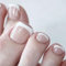 24Pcs Press on Toenails Short French White Tips False Toenails Square Artificial Nude Fake Toe Nails Acrylic Full Cover Summer Stick on Toe Nails for Women Girls Nail Salon and Nail Art DIY