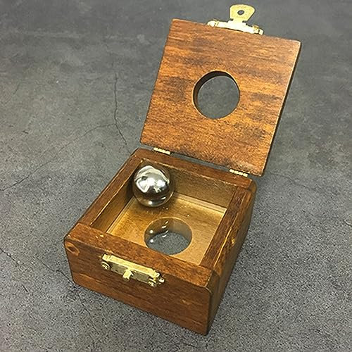 Bola de acero a través de cristal trucos de magia bola de metal penetra vidrio sólido en caja de madera penetración magia primer plano ilusiones trucos accesorios