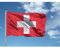 Drapeau Suisse 90 x 150 cm en polyester, avec double pli périmètre et boutonnière.