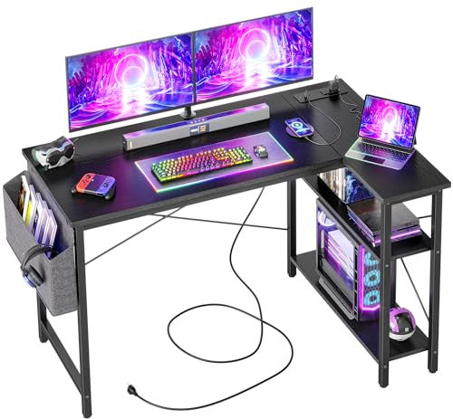 BEXEVUE Small L Shaped Desk with Power Outlets - 120x70cm Gaming Corner Computer Desk Writing Table, Reversible Large Storage Shelves, Bookshelf Workstation for Study Play Work Home Office Black