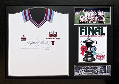 Allstarsignings West Ham United 1980 FA Cup Final shirt signed by Sir Trevor Brooking with COA and proof. Professionally framed and ready to hang.