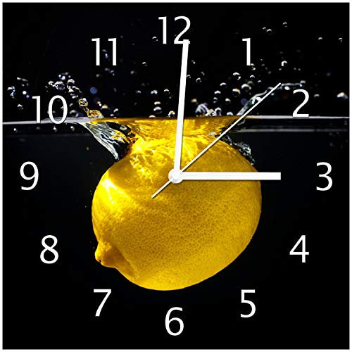 Wallario Design-Wanduhr Zitrone im Wasser - Frisches Obst für die Küche aus Glas, Motiv-Uhr Größe 30 x 30 cm, weiße Zeiger