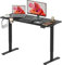 SANODESK Electric Standing Desk ONE PIECE 110 * 54 Height Adjustable Desk With Memory Smart Panel Sit Stand Table With Hooks and Cuphp;der for Home Office （Black Frame+ Black Desktop