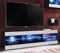 Komodee Banc TV Tivoli, Blanc Noir, Largeur 140 cm x Hauteur 40,5 cm x Profondeur 35,5 cm, LED Bleues, pour Salon, Chambre