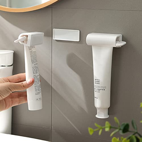 UDQYQ 2PCS Rollende Zahnpasta Tubenquetscher mit Magnetischem und Super Klebrigem Pad,Wandmontierbarer Zahnpasta Ausdrücker Spender,Platzsparend,Geeignet für Badezimmer Waschraum. (Weiß-Wandmontage)