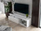 Dmora - Meuble TV Baltico, Buffet de Salon, Armoire Basse pour TV, Base Murale de Rangement, 160x38h41 cm, Blanc et Blanc Brillant