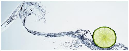 Wallario Küchenrückwand selbstklebend 115 x 50 cm, Motiv: Limettenscheibe in spritzigem Wasser | Spritzschutz abwischbar & pflegeleicht