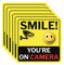 Smile You're On Camera Schild, doppelseitig, 6 Stück, 15,2 x cm, Vinyl-Aufkleber für Videoüberwachung, Schilder im Freien, laminiert UV und Wasser, Warnschilder, Sicherheitsschilder, Kameraschild