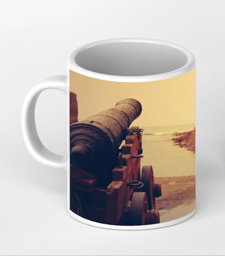 deyoli Motivetasse Alte Kanone am Küstenufer, historisch und majestätisch 300ml, aus weißem Keramik/Kaffetasse/Geschenkidee