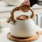 Liwankaqi Whistling Kettle,3 L Stove Top Kettle with a Clear Whistle and Wood Grain Handle,Stainless Steel Teapot for Induction, Electric, Gas, and Natural Gas Stovetops(Beige)