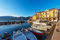 adrium Acryl-Bild 60 x 40 cm: Malcesine-Dorf. Hafen mit kleinen Booten und Fähren und bunten Häusern. Berühmter Touristenort an der Küste des Gardasees (195025206)
